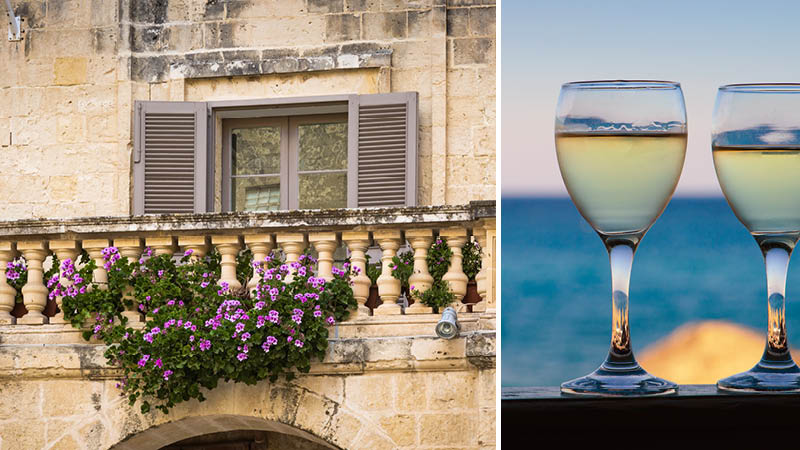Vacker balkongfasad med lila blommor och vitt vin vid havet p resa till Malta.