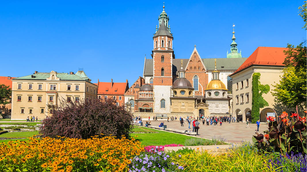 vr i krakow med blommor och wawelslottet